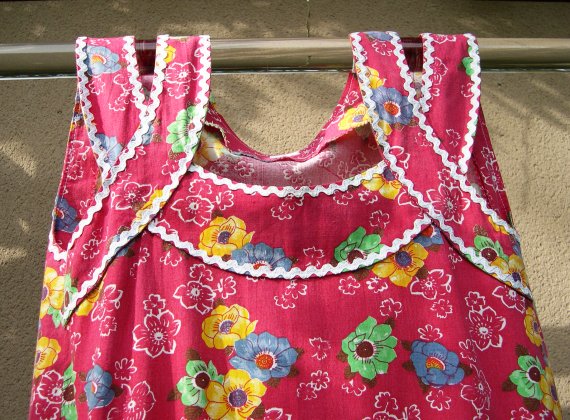 Robe sans manche tissu coton à fleur encolure